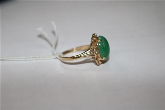 A 14ct gold jade and diamond set dress ring, size O.